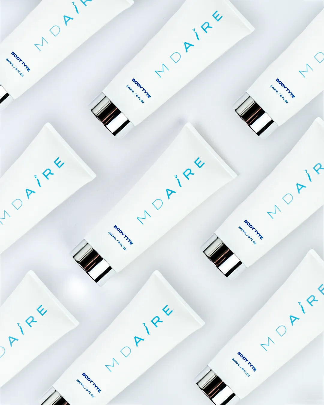 Multiple Body Tyte tubes arranged diagonally on a bright white backgro